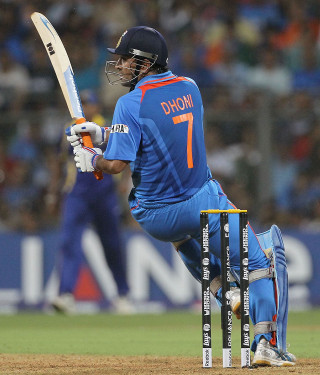 Man blue uniform playing cricket 2 - free sports wallpaper