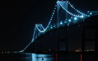 Bridge lit night boat water - the water below free wallpaper