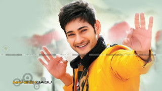 Man yellow jacket waving smiling - his hand in free wallpaper