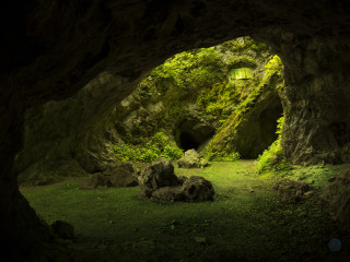Cave small entrance green lawn - a cave free wallpaper