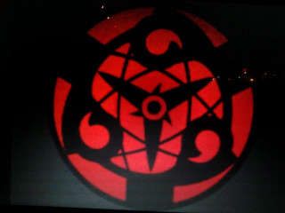 Red circular object black background - a red circle free wallpaper