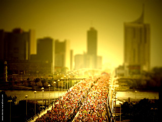 Crowd bridge city tall buildings - a large crowd of people free wallpaper
