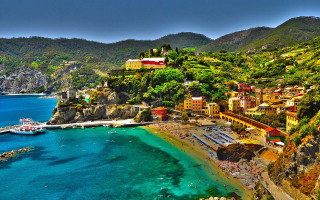 Beach boat mountain town water - the water and a mountain in the background free wallpaper