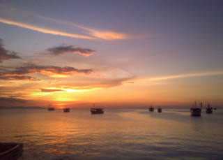 Boats sunset water clouds dawn - a group of boats free wallpaper