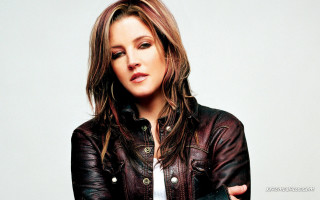 Woman leather jacket posing arms - post grunge free wallpaper