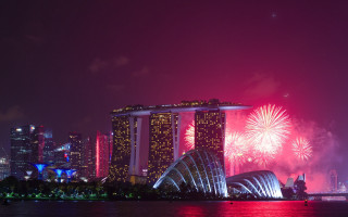 Fireworks city skyline night large - international typographic style free wallpaper
