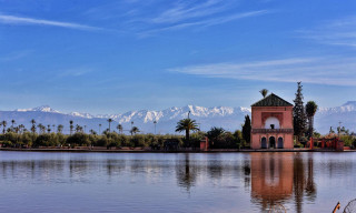 Lake building mountains blue sky - a matte painting free wallpaper for desktop