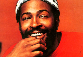 Man beard red shirt smiling - divinity free wallpaper