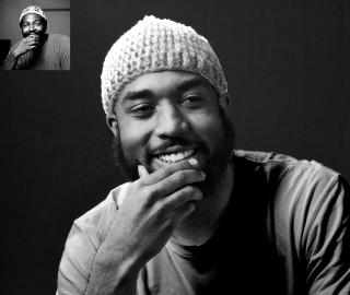 Man beard knitted hat smiles - black arts movement free wallpaper