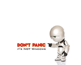 Robot pointing sign dont panic - a robot free wallpaper