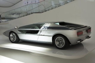 Silver sports car museum staircase - display in a museum free wallpaper