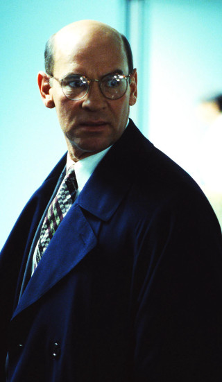 Man blue coat tie serious - his face and shoulders free wallpaper