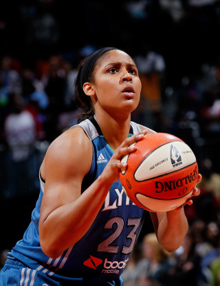Woman holding basketball looking up - betye saar free wallpaper
