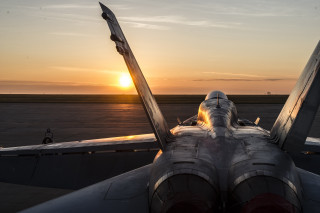 Jet fighter airplane airport tarmac 2 - a jet fighter plane free wallpaper