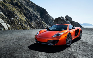 Orange sports car dirt mountain - the dirt free wallpaper
