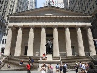 People building columns statue walking - front view free wallpaper