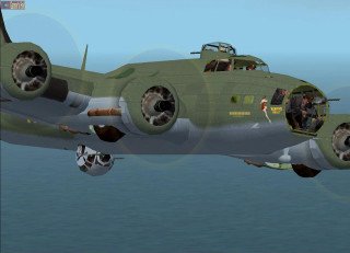 Military plane flying over water - a large military plane free wallpaper