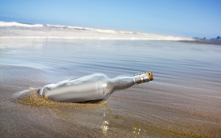 Message in bottle beach shore - wave free wallpaper
