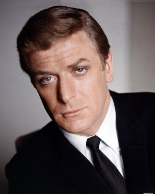 Man suit tie serious pose 4 - his face and shoulders free wallpaper