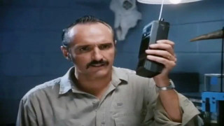 Man holding cell phone weird - a cell free wallpaper
