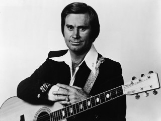 Man holding guitar posing picture 2 - dennis flanders free wallpaper