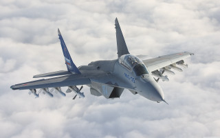 Fighter jet flying clouds sky 2 - the cloud free wallpaper