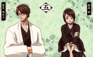 Man woman kimonos sitting wall - a man and a woman free wallpaper