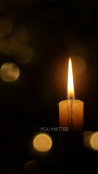 Candle lit candlestick blurry background - tonalism free wallpaper