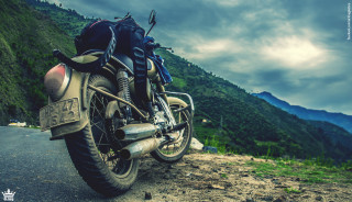 Motorcycle parked road mountain range 2 - a mountain range in the background free wallpaper