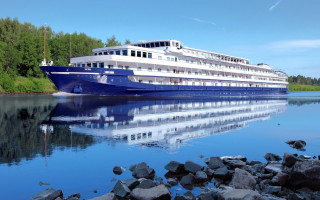 Large boat docked water rocks - cloisonnism free wallpaper