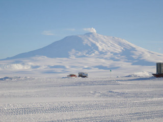 Snowy field mountain truck tracks - domirinic fegallia free wallpaper