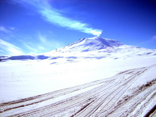 Snow covered mountain tracks blue - a few car free wallpaper
