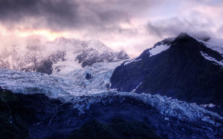 Snowy mountain cloudy sky lake 2 - covered free wallpaper