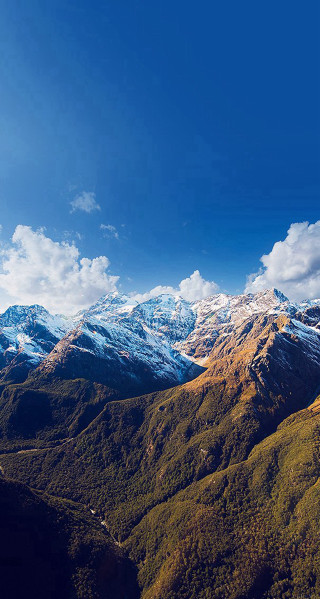 Mountain range snowy peaks blue - a detailed matte painting free wallpaper