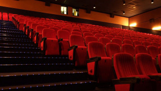 Red chairs theater blue lights - a theater free wallpaper