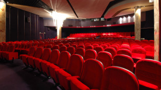 Red auditorium black ceiling lights - art deco free wallpaper