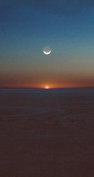 Sunset halfmoon distant moon ocean - amir zand free wallpaper