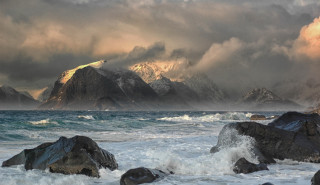 Mountain range water cloudy sky - stormy weather free wallpaper