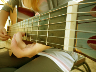 Person playing guitar hands strings 4 - a person playing free wallpaper