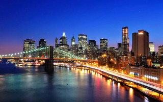 City skyline bridge river night 40 - a bridge in the foreground free wallpaper