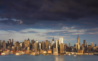 City skyline water cloudy boats 2 - a few boat free wallpaper