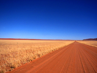 Dirt road dry grass blue - a dry grass field free wallpaper