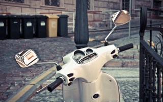 White scooter parked street fence - coppo di marcovaldo free wallpaper