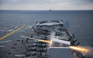 Battleship guns shooting water background - a large battleship free wallpaper