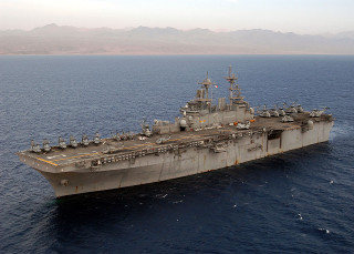 Large ship ocean mountains clouds - a large ship in the middle of the ocean free wallpaper