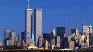 City towers boat water blue - a large city free wallpaper