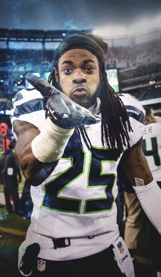 Football player helmet holding football - his hand and a helmet free wallpaper