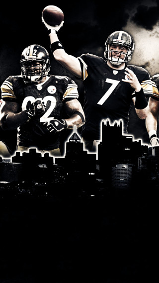 Football players city skyline dark 2 - a dark sky free wallpaper