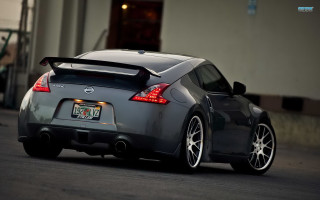Grey sportscar street building door - the street in front free wallpaper