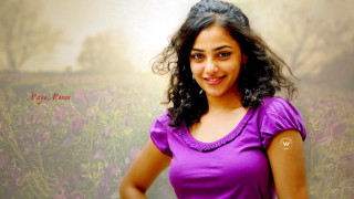 Woman purple shirt field flowers - movie still frame free wallpaper